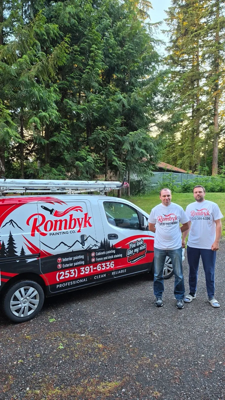 Rombyk Painting crew van on a residential driveway