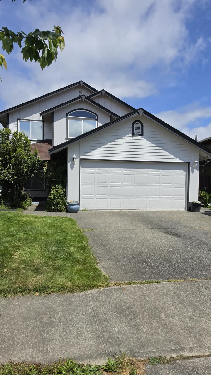 After exterior repaint with clean front elevation