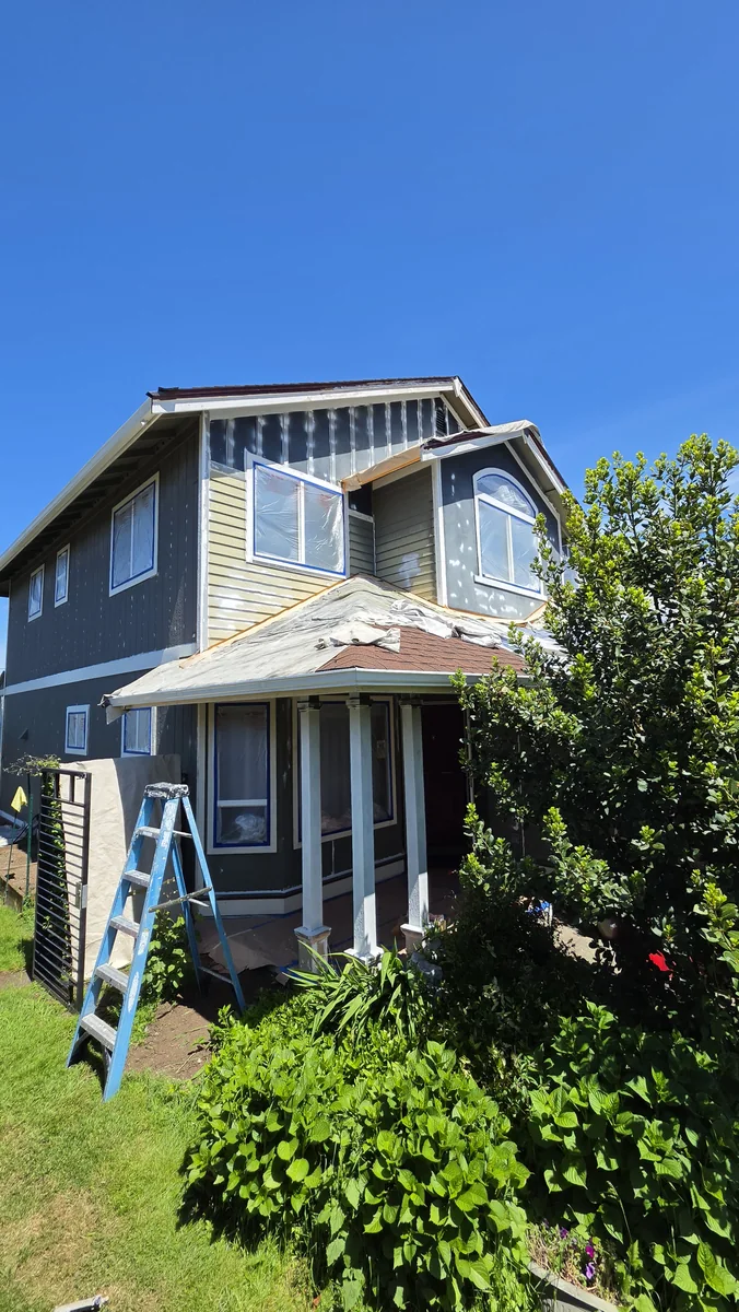 Exterior prep and masking in progress