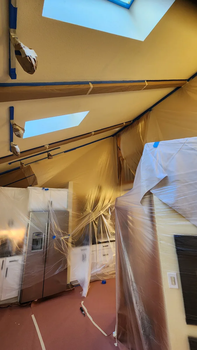 Interior masking and protection around windows and ceiling areas