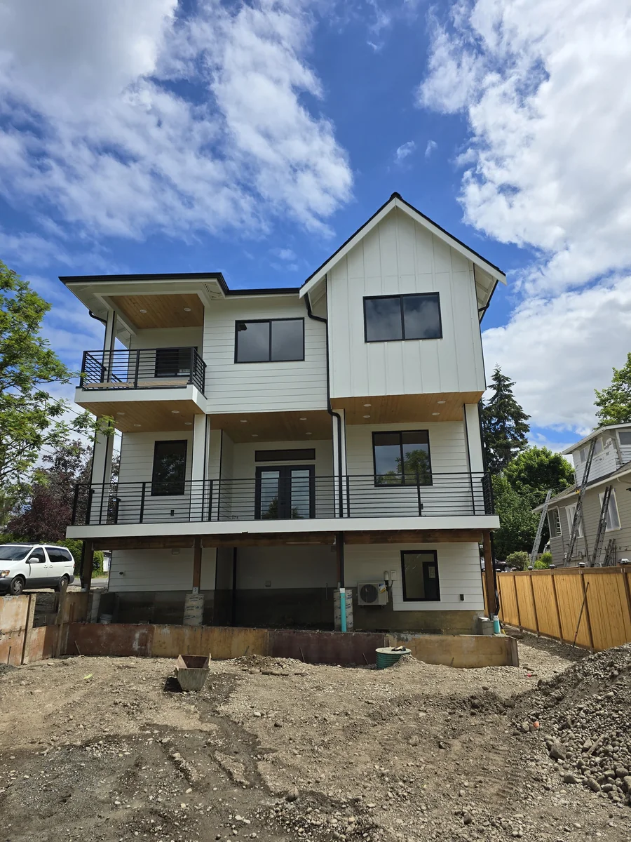 Front exterior detail with painted siding and trim